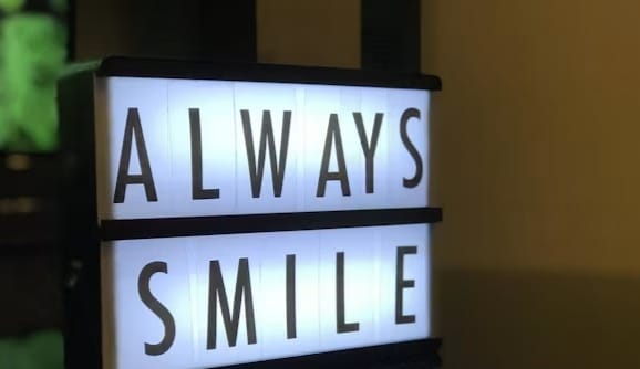 Happy patient after treatment at Olive Dental